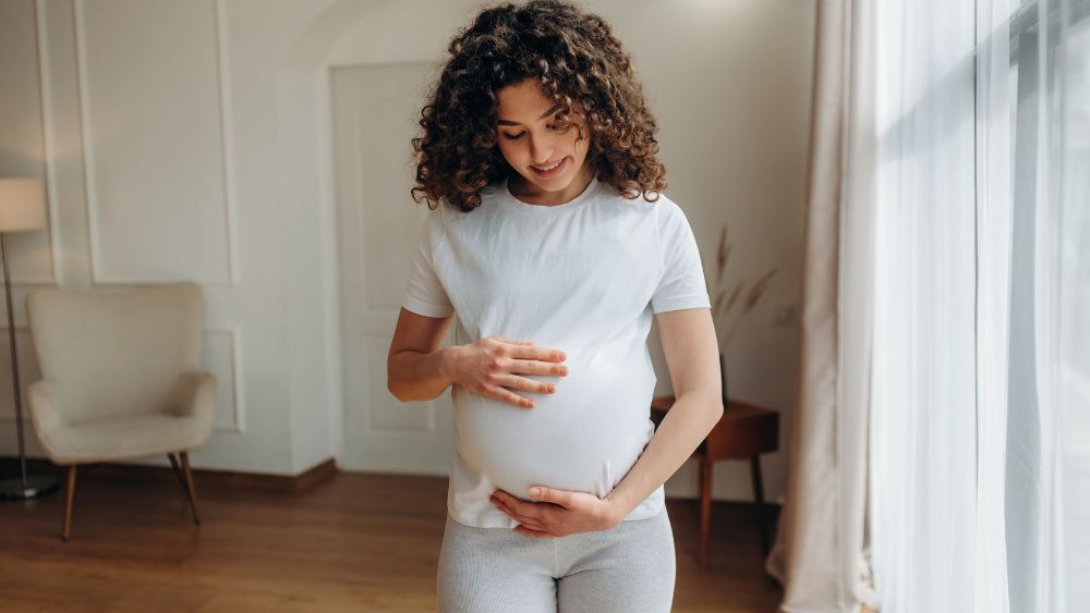Pregnant Woman Feeling Baby Kick - DR Vinayak das Blog